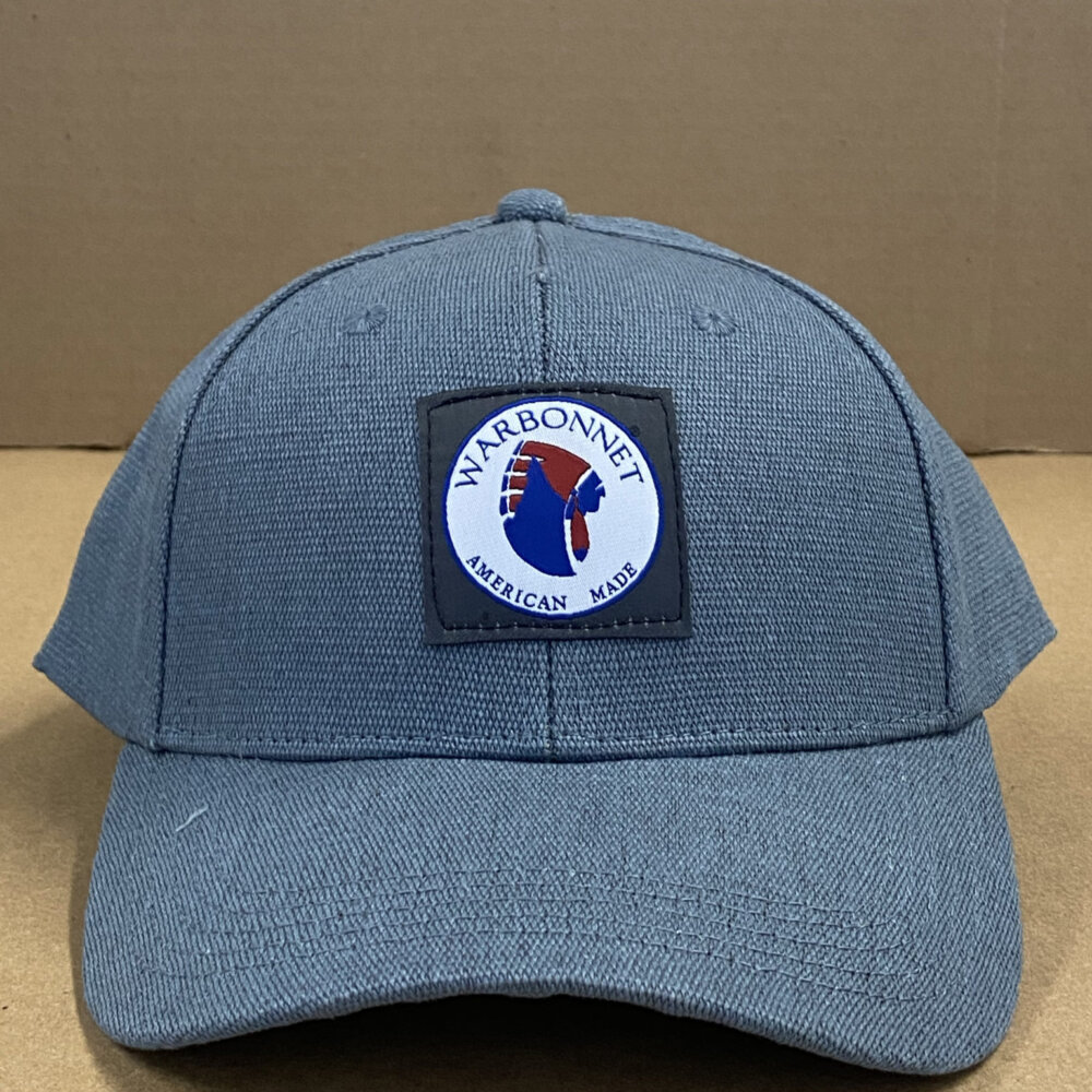 Front View of Blue Hat with Warbonnet Logo Patch