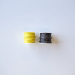 grey and yellow guyline reels