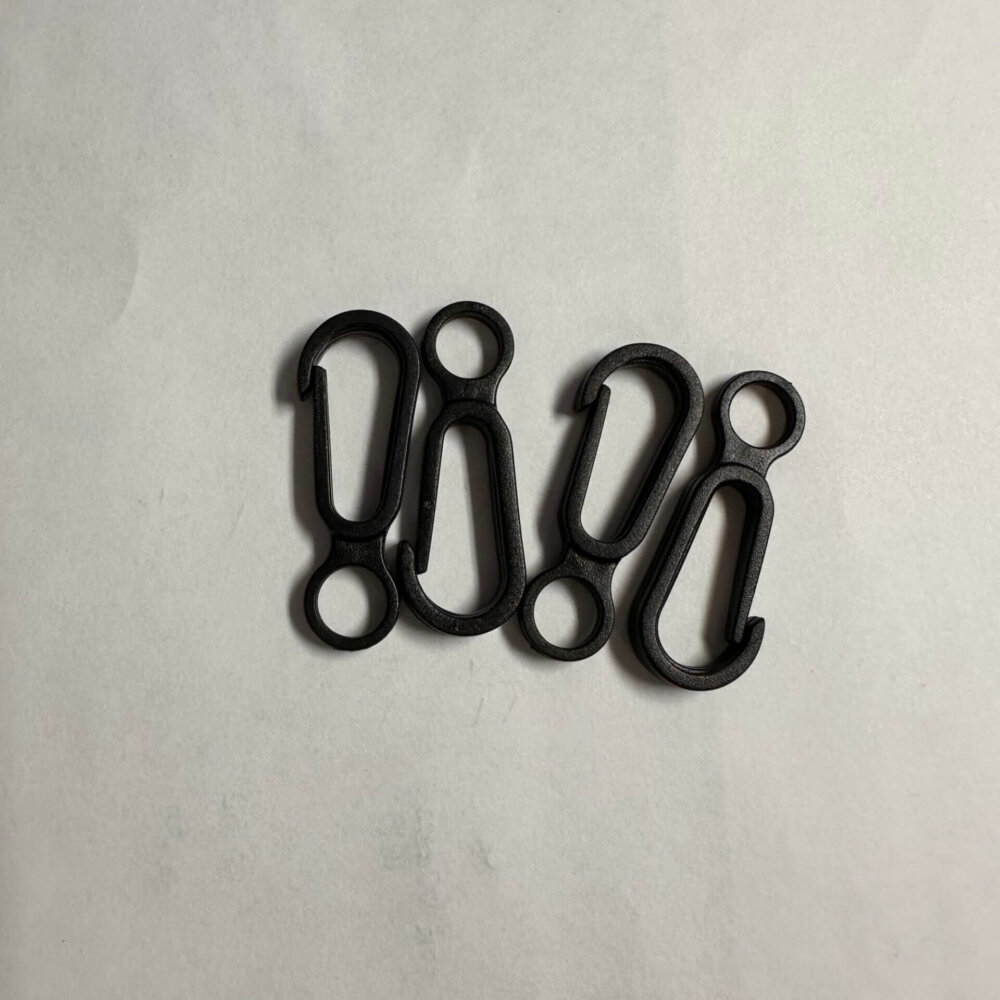 Four black mitten hook clips